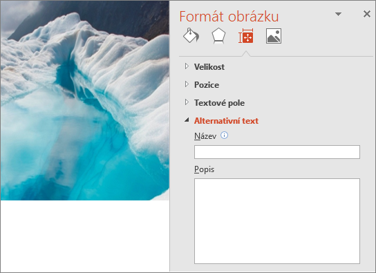 Starší obrázek ledovcového jezera s dialogovým oknem Formát obrázku bez alternativního textu v poli Popis.
