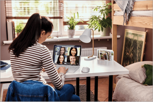 Student participates in Microsoft Teams video call on a laptop