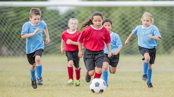 foto anak-anak di tim olahraga yang bermain di turnamen