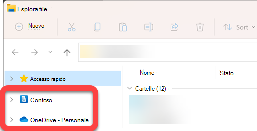 Nel riquadro di spostamento sul lato sinistro di Esplora file sono presenti cartelle di primo livello per una raccolta di SharePoint sincronizzata e un OneDrive sincronizzato.