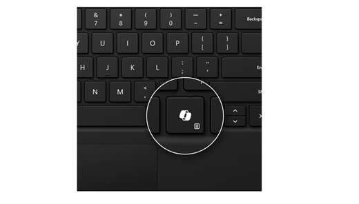 Captura de ecrã a mostrar a tecla Copilot no Surface Pro Keyboard para Empresas preto.