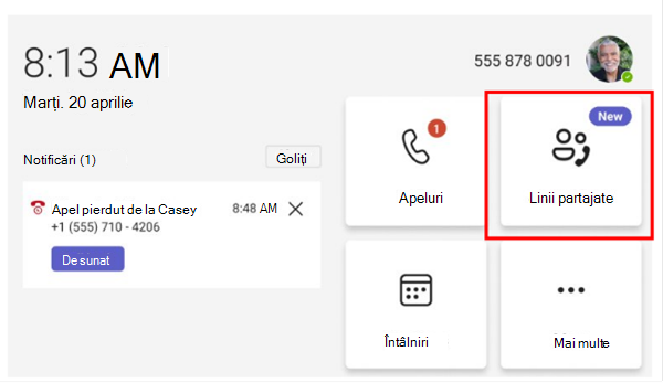 O imagine cu ecranul de pornire al telefonului de birou Teams. O casetă roșie evidențiază butonul etichetat Linii partajate.