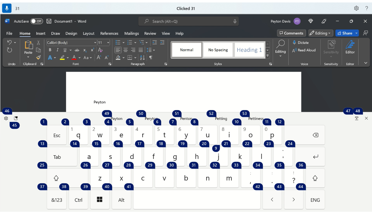 Tastatura tactilă Windows afișând numărul de acces vocal suprapus pentru ortografierea unui nume.