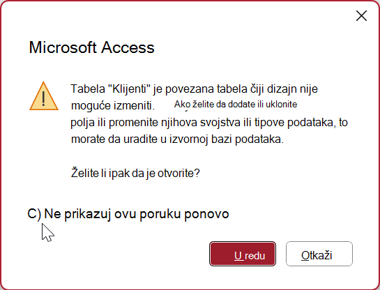 Poruka upozorenja u programu Access o otvaranju povezane tabele u prikazu dizajna. Izabrano je polje za potvrdu Ne prikazuj ponovo ovu poruku.