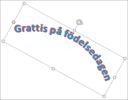 Rotera WordArt med roteringshandtaget